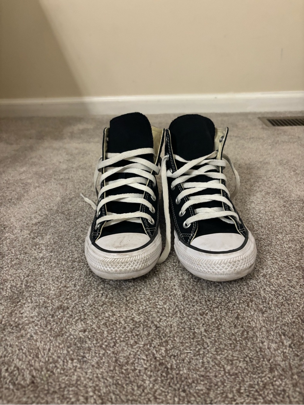 Converse women’s Black High-Top Sneakers with White Accents